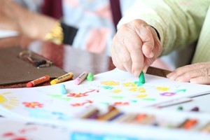 Elderly person's hand coloring